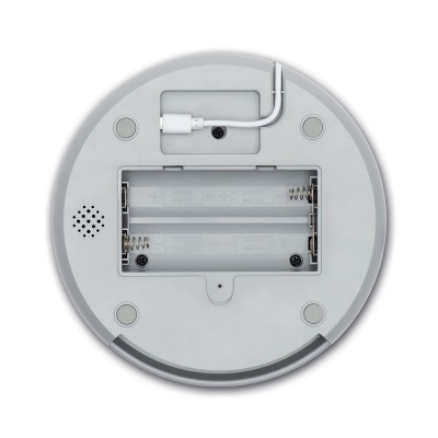 Base inferior de dispositivo redondo cinzento com compartimento para pilhas e cabo branco