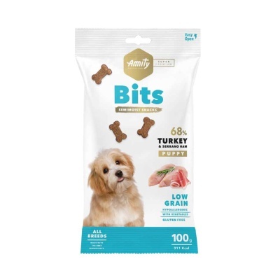 Pack de snacks para cachorros Amity Bits sabor peru e presunto serrano com imagem de cachorro e ossinhos no pacote