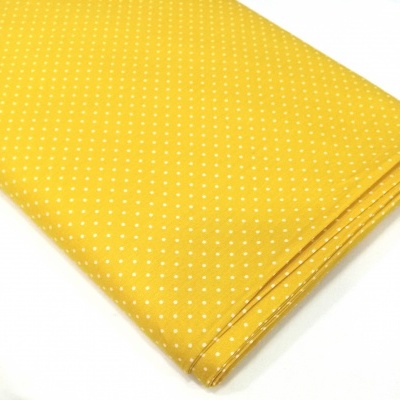 Poppy - Pintinhas brancas em fundo amarelo