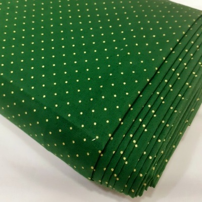 Pintinhas douradas em fundo verde