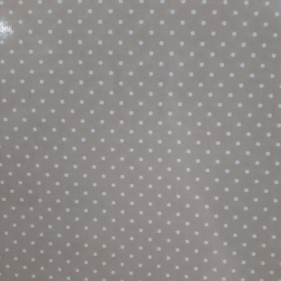 Plastificado com pintinhas brancas em fundo creme