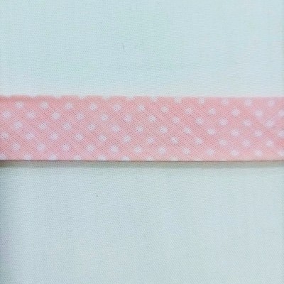 viés com pintinhas brancas em fundo salmão