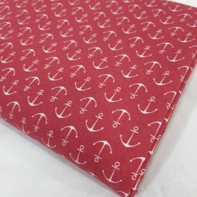 Âncoras em fundo vermelho pálido