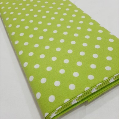 Bolas brancas em fundo verde vivo