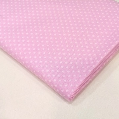 Estrelinhas em fundo rosa bebé