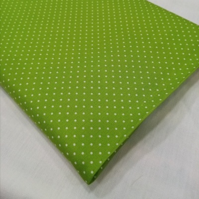 Poppy - Pintinhas brancas em fundo lima