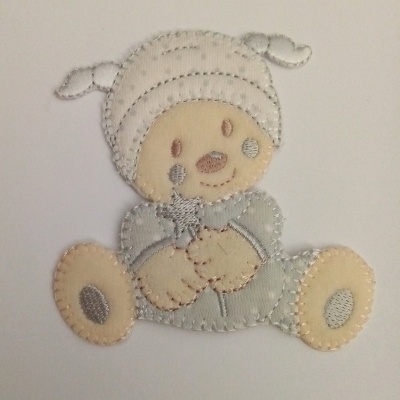 Bebé com varinha mágica em cinza