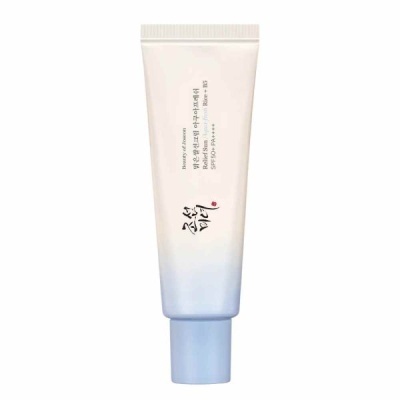 Tubo de creme cosmético com tampa azul claro e texto em inglês e coreano.