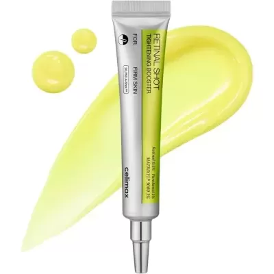 Tubo de creme prateado e verde RETINAL SHOT TIGHTENING BOOSTER com manchas amarelas de creme no fundo