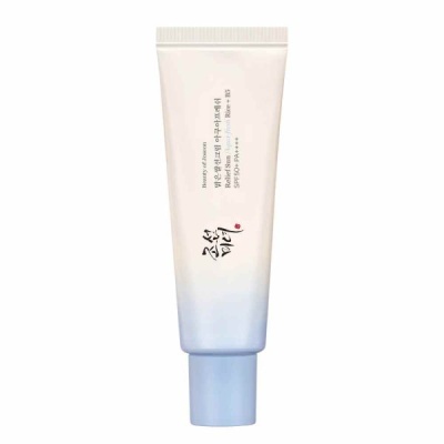 Tubo de creme cosmético com tampa azul claro e texto em inglês e coreano.