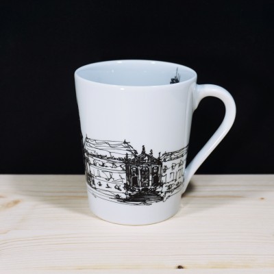 Caneca branca com ilustração preta de edifício