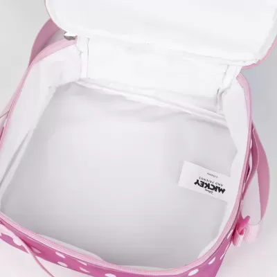 Bolsa rosa com bolinhas brancas aberta e interior branco com etiqueta
