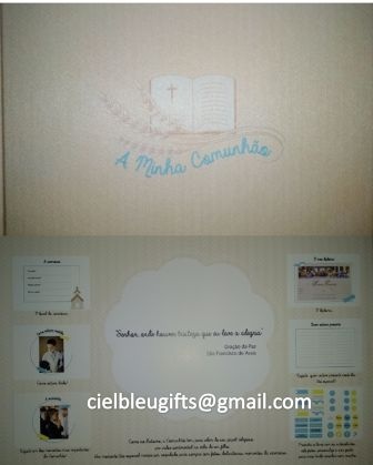 Caixa ou álbum bege com bordado azul e várias imagens e textos impressos num fundo branco.