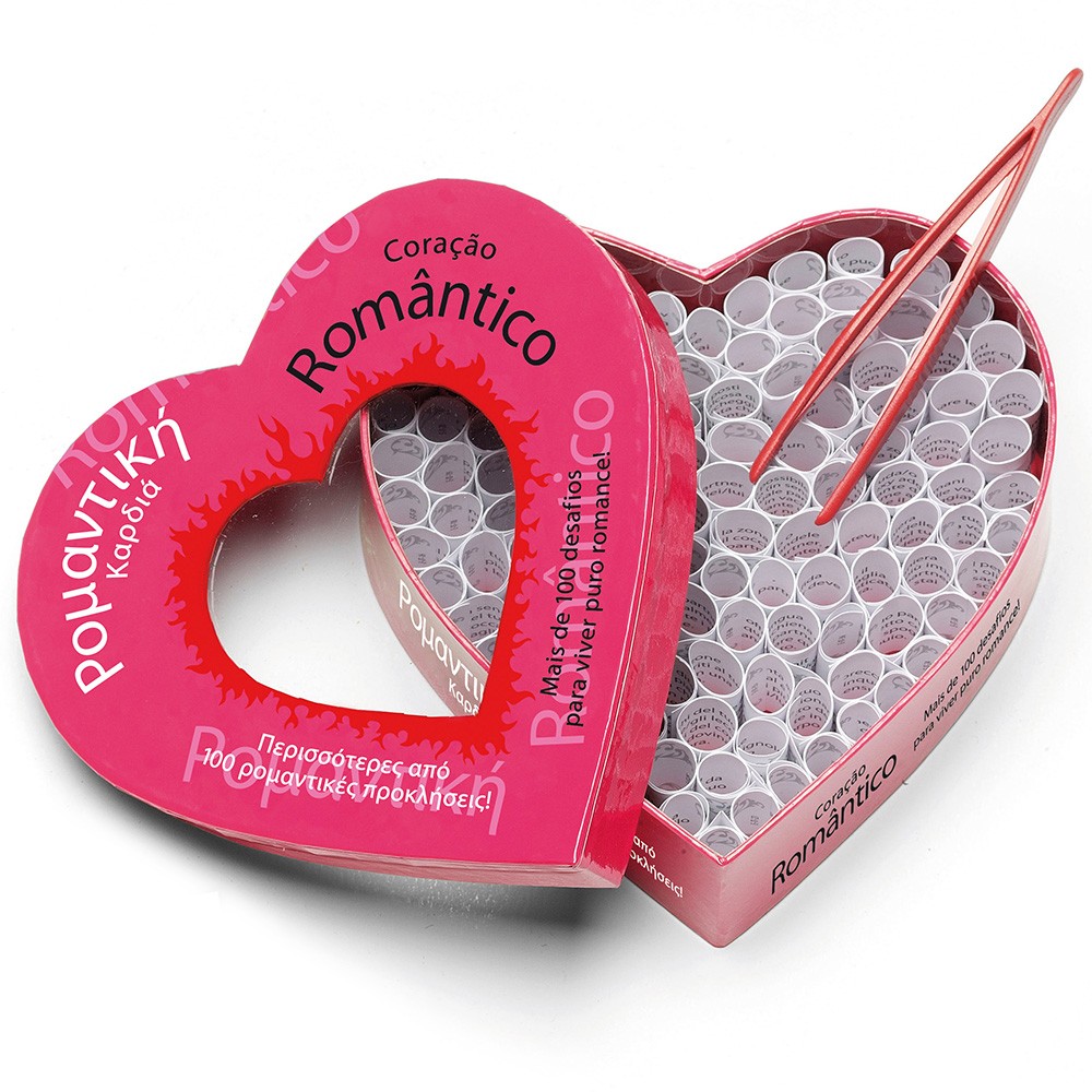 Caixa em forma de coração cor-de-rosa com pequenos rolos de papel e pinça cor-de-rosa