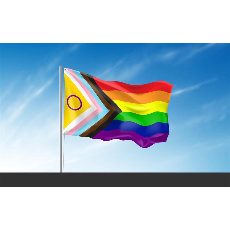 Bandeira colorida com padrão arco-íris a voar no céu