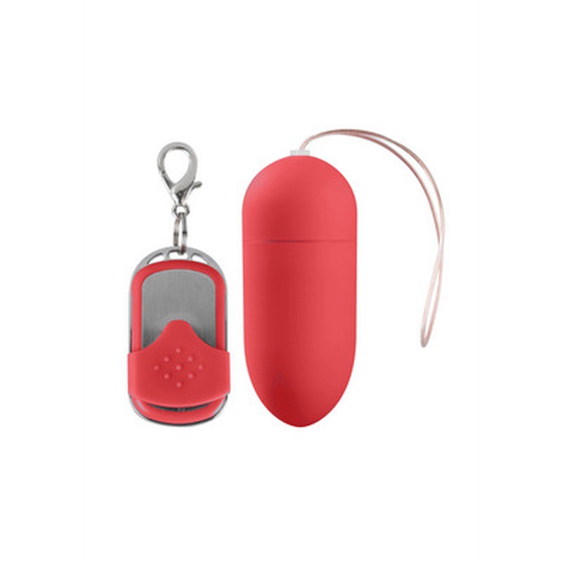 Dispositivo oval vermelho com correia e controle remoto em metal e silicone vermelho