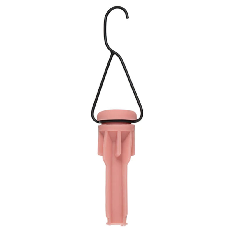 Dispositivo plástico rosa com gancho preto em fundo branco