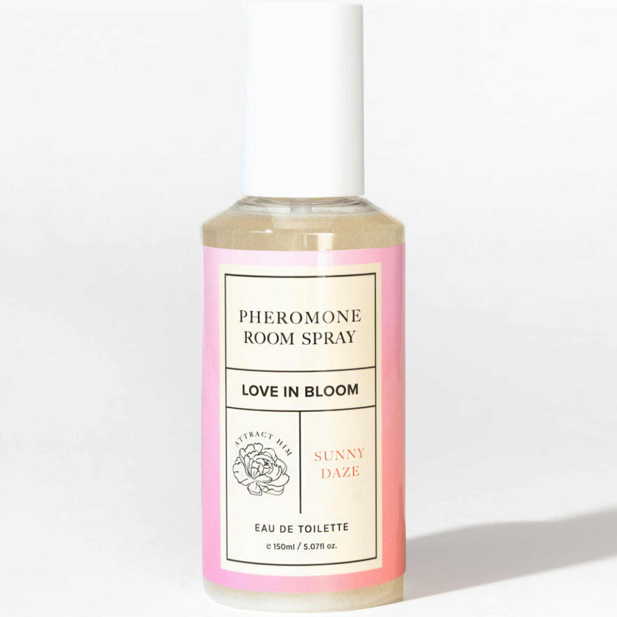 Frasco de spray de ambiente pheromone com etiqueta rosa e branca