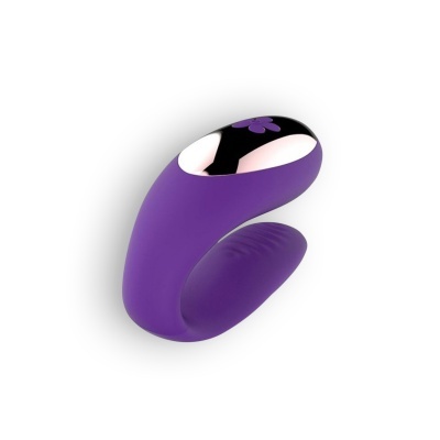 Produto em silicone roxo com parte superior preta brilhante e flor roxa