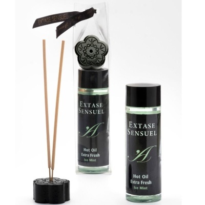 Frasco de óleo quente Extase Sensuel com suporte preto em forma de flor e palitos de madeira