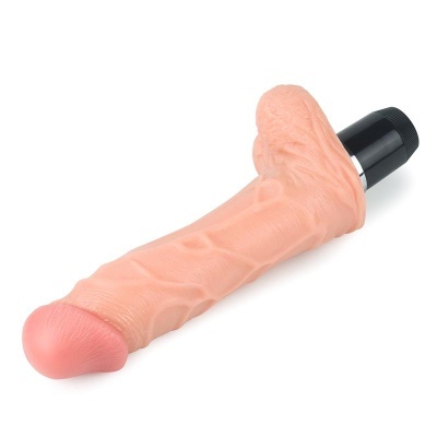 Vibrador realista cor de pele com base preta sobre fundo branco