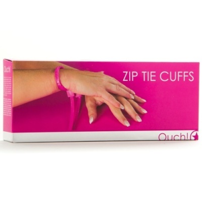 Caixa cor-de-rosa com algemas zip tie cor de rosa e texto ZIP TIE CUFFS