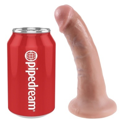 Dildo realista cor pele ao lado de lata vermelha com texto pipedream