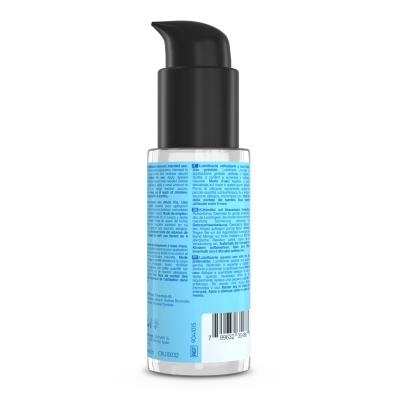 Frasco com dispensador preto e etiqueta azul com texto sobre lubrificante