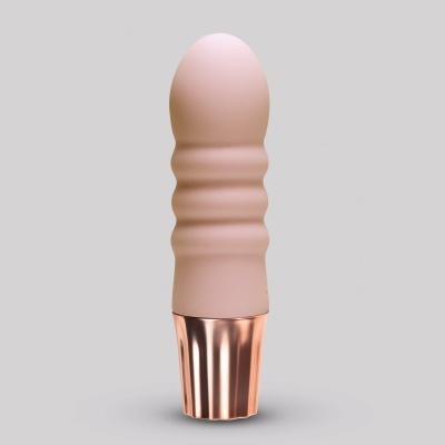 Pincel de maquilhagem cor de rosa ouro e rosa suave com textura