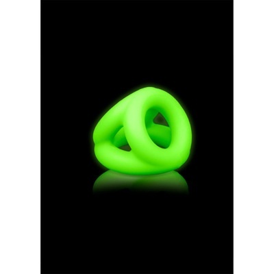 Dois anéis verdes fluorescentes entrelaçados sobre fundo preto