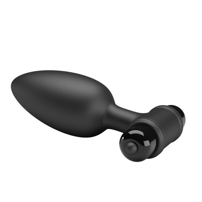 produto preto oval com peça cilíndrica e botão brilhante