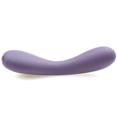 Vibrador lilás curvado em silicone sobre fundo branco