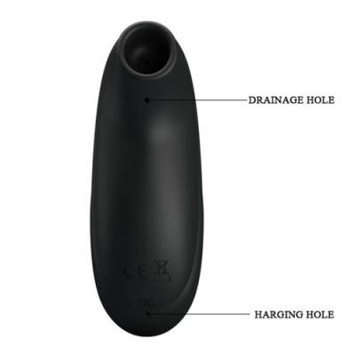 Produto preto oval com orifícios e etiquetas CE em fundo branco