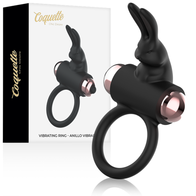 Anel vibratório preto com coelho e embalagem branca com texto Coquette