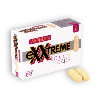Caixa branca e cinza de cápsulas eXXtreme libido para mulheres com duas cápsulas amarelas ao lado.