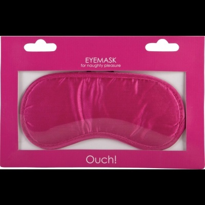 Máscara para os olhos cor-de-rosa numa embalagem rosa com texto