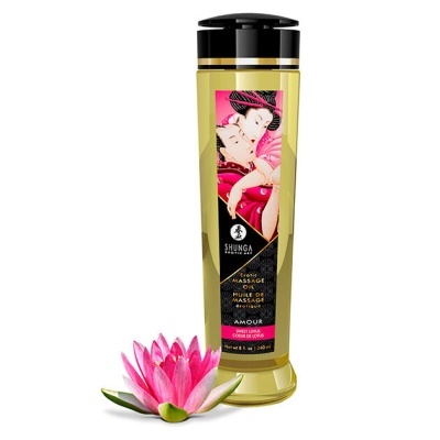 Frasco de óleo de massagem erótica Shunga com fronha de lótus rosa