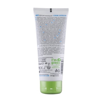Frasco plástico branco com tampa verde de lubricant à base de água bio com texto multilingue.