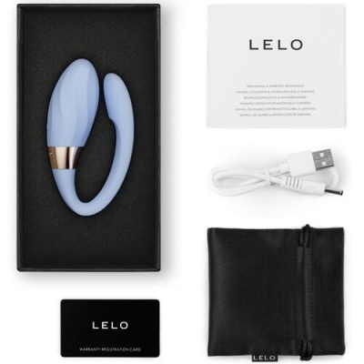 Conjunto LELO com vibrador azul claro, manual, cabo USB, cartão de garantia e saco preto.