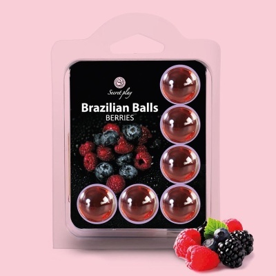 Embalagem transparente com seis esferas vermelhas e rótulo preto com texto e imagem de frutos vermelhos