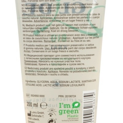 Tubo transparente com tampa verde e texto informativo sobre o produto médico