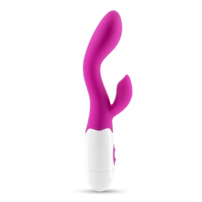 Vibrador rosa de silicone com base branca e botão de controlo em fundo branco