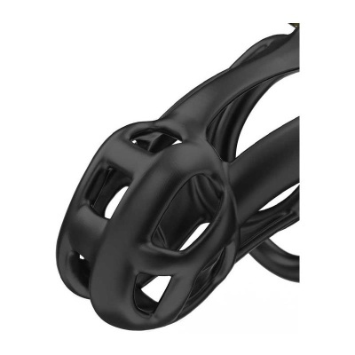 Acessório preto de silicone com design oco e várias aberturas.
