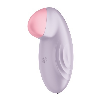 Aparelho de silicone lilás com parte rosa e formato ergonómico