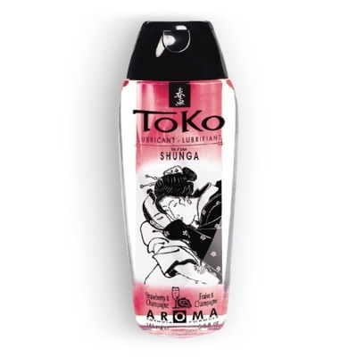 Frasco de lubrificante Toko transparente com tampa preta e rótulo com imagem japonesa
