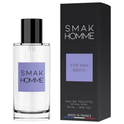 Frasco de perfume transparente com tampa preta e caixa preta com texto
