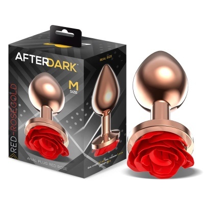 Plug anal metálico rosa dourado com flor vermelha na base e embalagem preta