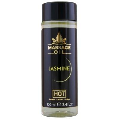 Frasco de óleo de massagem jasmin com tampa preta e rótulo preto com texto dourado e amarelo.