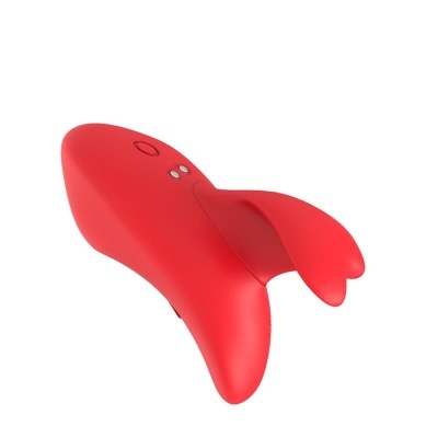 Dispositivo vermelho em forma de cauda de peixe com botão e indicadores.