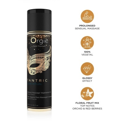 Frasco preto com óleo vegetal para massagem sensorial com rótulo dourado e texto.